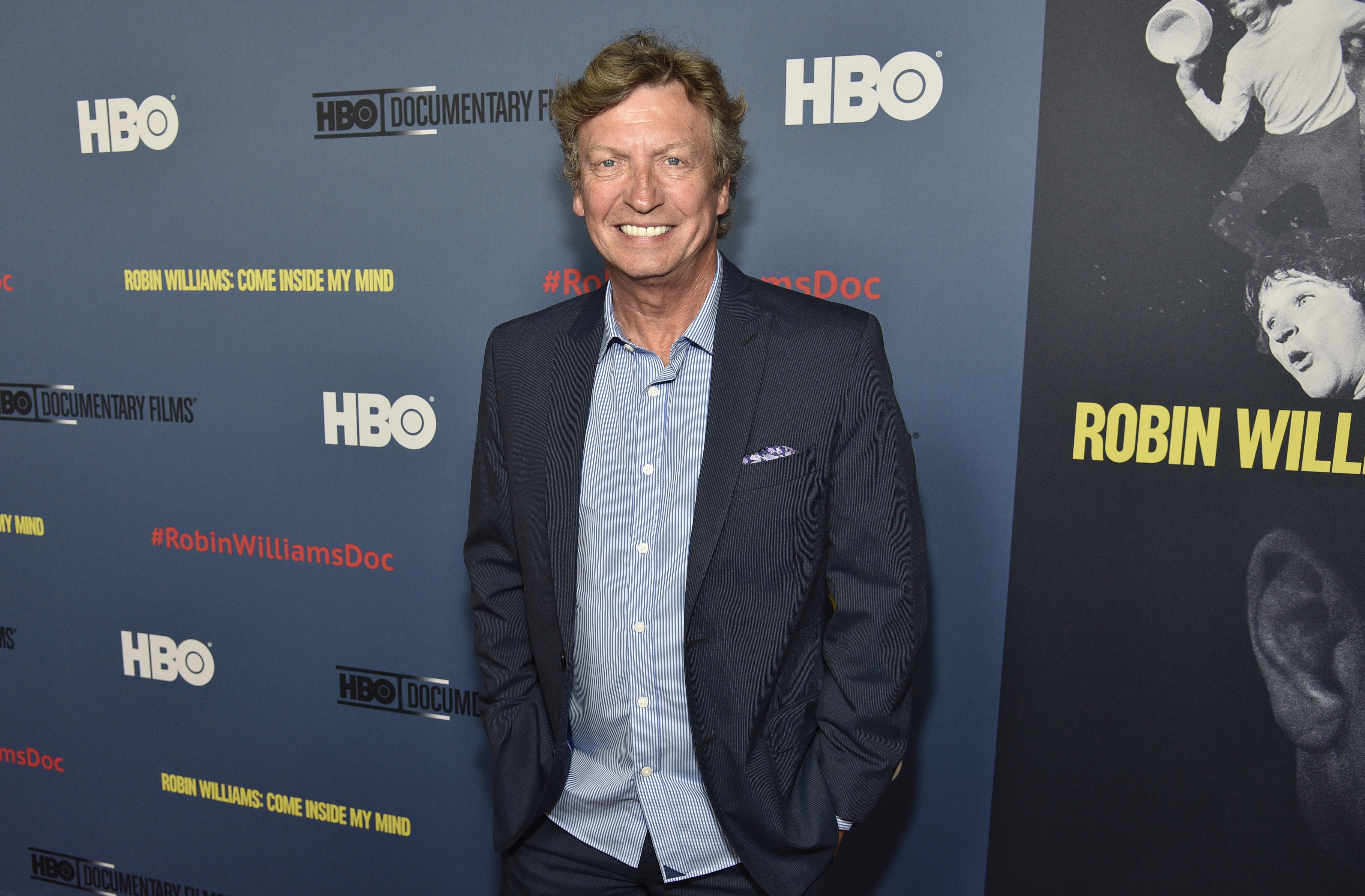 FILE - Nigel Lythgoe arrives at the Los Angeles premiere of "Robin Williams: Come Inside My Mind" at the TCL Chinese Theatre on Wednesday, June 27, 2018. TV producer Nigel Lythgoe said Friday, Jan. 5, 2024 that he is stepping aside as a judge on “So You Think You Can Dance” after lawsuits accusing him of sexual assault, including one from Paula Abdul. (Photo by Chris Pizzello/Invision/AP, File)