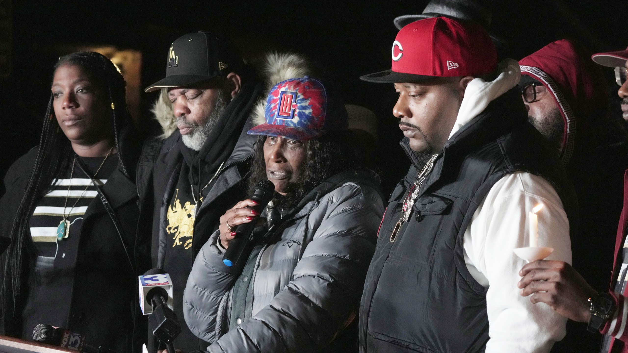 RowVaughn Wells, second from left, the mother of Tyre Nichols, flanked by family members of Nichols, speaks during a candlelight vigil on the anniversary of her son's death Sunday, Jan. 7, 2024, in Memphis, Tenn. Nichols lost his life following a violent beating by five Memphis Police officers in January 2023. (AP Photo/Karen Pulfer Focht)