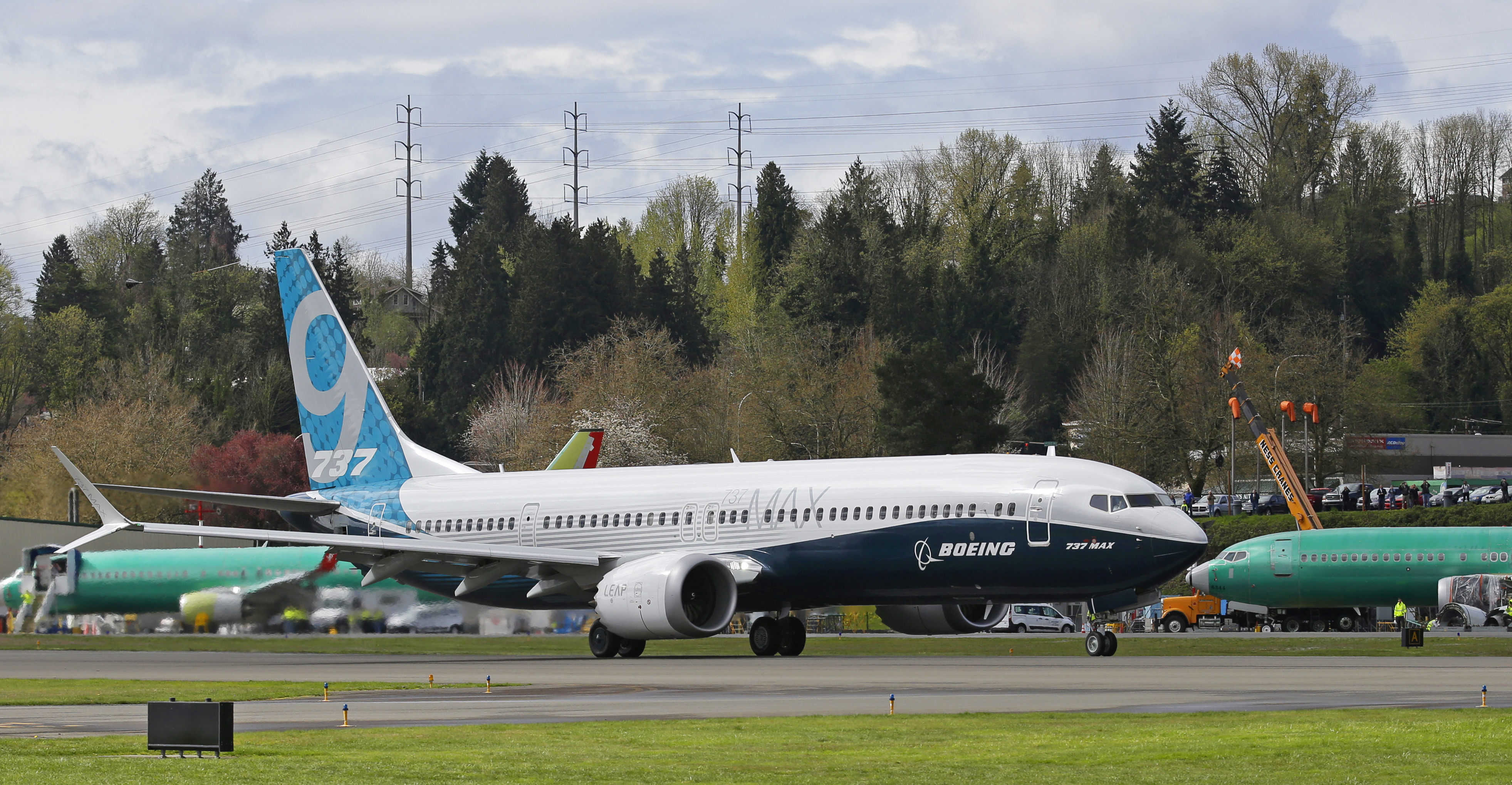 FILE - A Boeing 737 MAX 9 taxis past unpainted planes as it gets ready to takeoff for the aircraft's first flight, Thursday, April 13, 2017, in Renton, Wash. On Saturday, Jan. 6, 2024, U.S. officials ordered the immediate grounding of Boeing 737-9 Max jetliners after an Alaska Airlines plane suffered a blowout that left a gaping hole in the side of the fuselage. (AP Photo/Ted S. Warren, File)